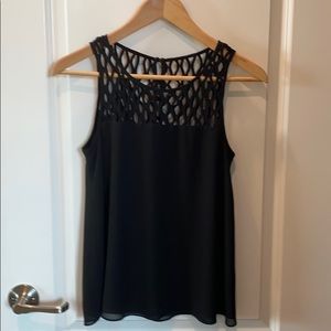 Black sleeveless blouse